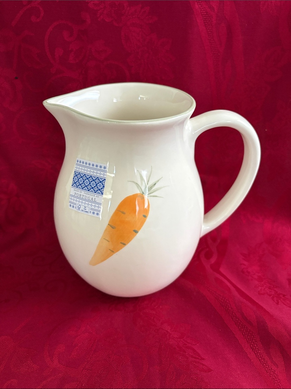 Portugal ceramic pitcher featuring a carrot design New